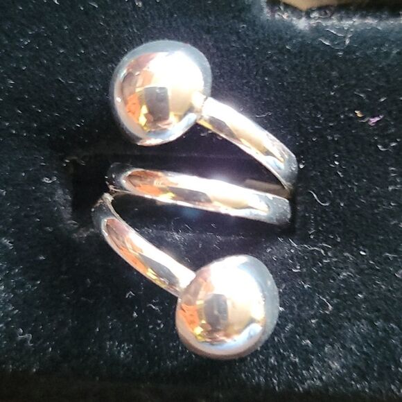 Jewelry - Sterling Silver Wrap Around Ring. Sizes 6 and 7 available.